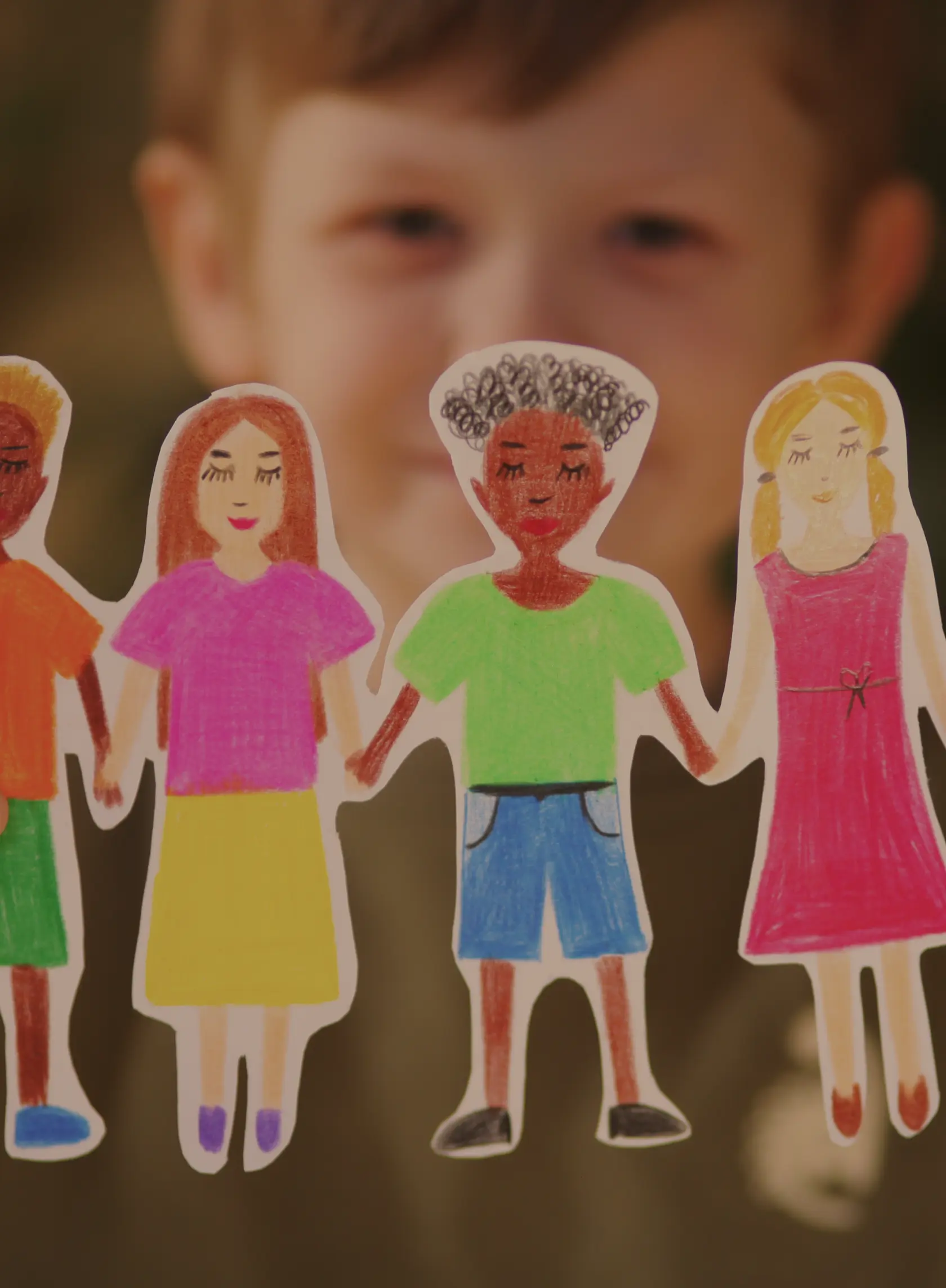 Children with paper cutouts