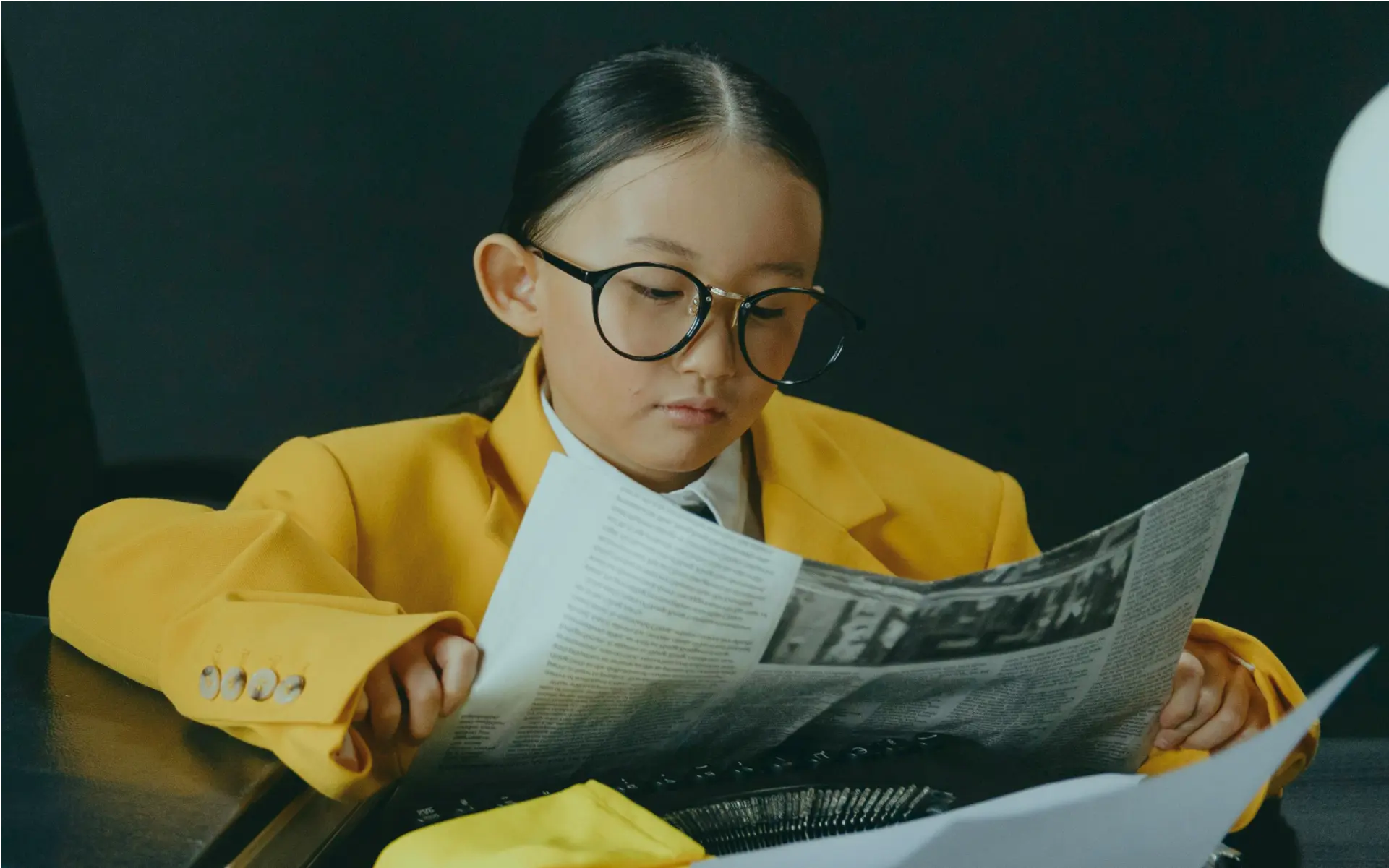 Children with paper cutouts